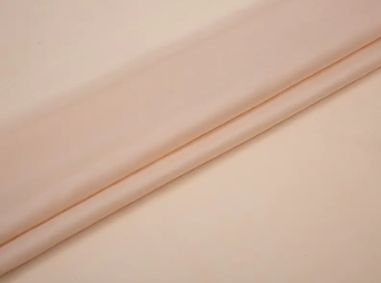 Poate țesătura de căptușeală cu vâscoză din poliester să mențină stabilitatea îmbrăcămintei în medii calde și umede?